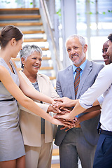 Image showing Businesspeople, stacked hands and teamwork for happy office employees with smile. Corporate professional, coworkers in workspace for cooperation with partnership, people in law firm career or support