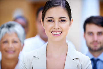 Image showing Leadership, portrait and business woman with group in office for collaboration, teamwork or support. Face, smile or female lawyer with paralegal team at law firm for startup, about us or career