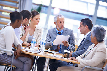 Image showing Group, businesspeople and meeting discussion together in office, diversity teamwork with professionals. Partnership, collaboration with staff in workplace for business merger, law firm with paperwork