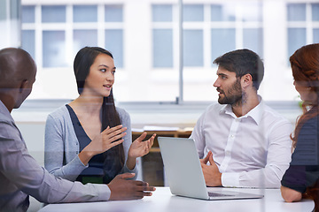 Image showing Business people, meeting and boardroom teamwork at tech startup for brainstorming, project planning or collaboration. Men, women and conversation with laptop for b2b partnership, decision or report