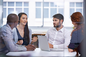 Image showing Business people, meeting and conference room teamwork or startup for brainstorming, project planning or collaboration. Men, women and conversation with laptop for b2b partnership, decision or report