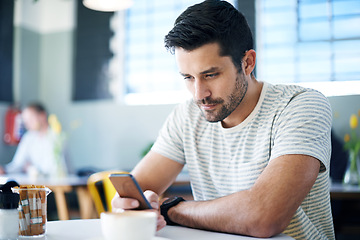 Image showing Man at restaurant, smartphone and scroll on social media, reading on mobile app or ebook with communication and contact. Chat, email or text message with tech, search internet and online at cafe