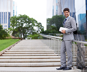 Image showing Businessman, park and newspaper with commute, travel and thinking for career or job. Man, walk and cape town with downtown, startup or professional work with morning routine in urban environment