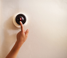 Image showing Hand, child and switch on wall for light, electricity and power in house, home and living room with mockup space. Touch, lever and finger of kid by electrical button for lighting, lamp and glow