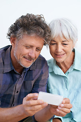 Image showing Happy, phone and mature couple networking internet, mobile app or website together for bonding. Smile, love and senior man and woman reading online blog for information with cellphone for marriage.