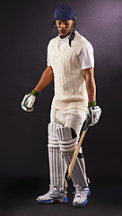 Image showing Man, cricket and athlete for sports exercise in studio for professional match, competition or black background. Male person, gear and helmet with mockup space or fitness training, performance or game