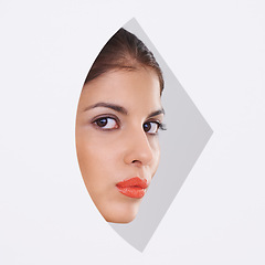 Image showing Young woman, portrait and makeup in a cutout and studio for cosmetics, skincare and dermatology. Face of model in beauty and foundation with geometric closeup and creative shape on a white background