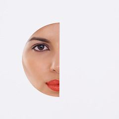 Image showing Woman, face and beauty in a cutout and studio for cosmetics, skincare and dermatology. Portrait of a young model with makeup, foundation and art deco, closeup or mockup space on a white background