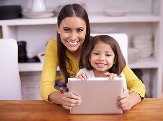 Image showing Portrait, home and mother with girl, tablet and bonding together with a smile and connection. Face, family and mama with daughter and relax with technology and internet with social media and website