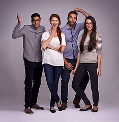 Image showing Group, people and happy in studio portrait for creative collaboration, choice and decision for fashion. Young women and men in casual clothes in surprise, wow and excited or idea on a gray background