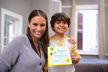 Image showing Child, mom and portrait with card for mothers day, surprise and appreciation for love and kindness. Indian people, parent and boy with smile and joy with gift for giving, celebrating and childhood