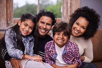 Image showing Parents, children and portrait at family in home for bonding connection on weekend, holiday or apartment. Mother, father and siblings with face in living room for happy care together, love or calm