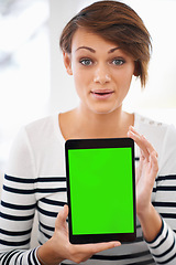 Image showing Woman, surprise and tablet for mockup, green screen and advertising online for technology or app user. Information, news or announcement on internet, digital marketing and web ads with UX at home