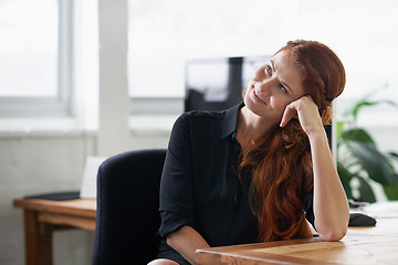 Image showing Business woman, thinking and idea by desk, planning and contemplating choice or decision. Happy female person, office and dream of career opportunity in workplace, startup company and entrepreneur