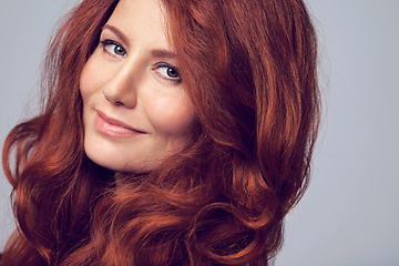 Image showing Ginger, beauty and portrait of woman with hair care in studio, background and mockup. Cosmetics, makeup and red dye for natural shine and color on hairstyle or healthy skincare from dermatology