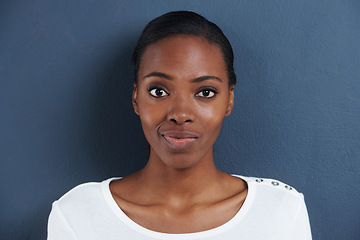 Image showing Black woman, portrait and doubt in studio with confused, thinking and unsure of planning. African model, question or smirk face with expression of whatever for decision or closeup by blue background