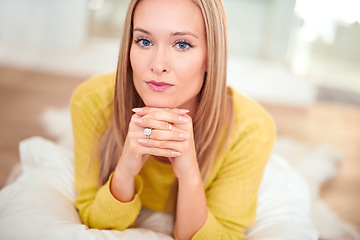 Image showing Portrait, woman and thinking in home, relax on floor with thoughtful serious and calm female person. Weekend break, lounge carpet and living room, chilling and comfortable or resting and pensive face