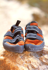 Image showing Rock climbing, shoes and mountain sport with rubber soles to support performance and precision for feet safety. Nature sports, equipment or edging for smearing on rocky surface or balance for agility