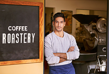 Image showing Barista, cafe and man with arms crossed in portrait for small business, owner with confidence and service. Entrepreneur, coffee shop and drinks with hospitality, professional and server in industry