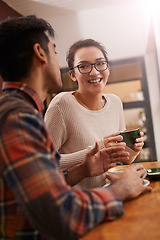 Image showing Couple, date and coffee shop with funny joke and talking together with hot drink in a cafe. Woman, smile and happy from discussion and chat in a restaurant with tea or cappuccino at a table