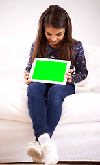 Image showing Home, green screen or child with tablet for mockup, playing games or streaming videos on movie website. Space, online or female kid with ebook or technology to download on social media app on sofa