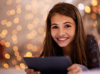 Image showing Portrait, night or girl with tablet for streaming, playing games or watching videos on a movie website. Smile, house or happy child with technology to download online or social media app to relax