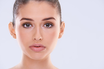 Image showing Portrait, wellness and dermatology with woman, cosmetics and grooming on white studio background. Face detox, person or model with beauty, skincare and glowing with healthy skin, aesthetic and luxury