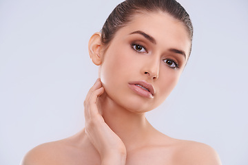 Image showing Dermatology, beauty and portrait for woman in studio for skincare and wellness with makeup for clean, clear and smooth. Model or young person with lipstick for shine and face for hygiene and fresh