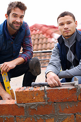 Image showing Building, bricklayer and working with industrial tools, maintenance employee with brick wall for renovation. Contractor, together on building project to layer cement on construction site on rooftop