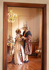 Image showing Dance, man and woman in royal castle together with vintage love, romance and party in banquet hall. Medieval king, queen or renaissance couple in ballroom holding hands with celebration in palace