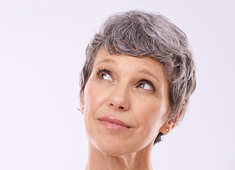 Image showing Idea, thinking and senior woman in studio for faq, brainstorming or problem solving on white background. Questions, planning and old lady model curious about announcement, information or deal offer