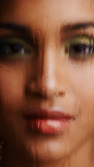 Image showing Glass window, makeup and water with woman, portrait and dermatology with confidence and artistic. Face, person and girl with aesthetic and liquid with beauty and cosmetics with wellness and hydration