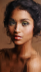 Image showing Woman, face or wet beauty with glass, window or sauna for skin detox, hydration or moisture in studio. Water, makeup or female model with pure, cleanse or cosmetic toner, removal or dermatology steam