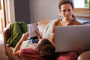 Image showing Relax, book and laptop for happy couple, couch and living room in home. Technology, computer and reading or learning on weekend or vacation, house or lounge or partner together for bonding on holiday