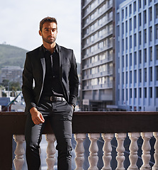 Image showing Portrait, style and businessman on balcony in suit and formal fashion for professional in city. Real estate agent, face or confidence of entrepreneur in property, job or ambition of friendly realtor