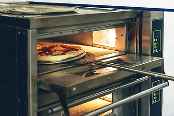 Image showing Fresh pizza baked in oven