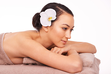 Image showing Spa, wellness and white background of woman for massage, relax or luxury treatment for stress relief. Natural, skincare and female person with flower for zen, self care and detox in studio backdrop