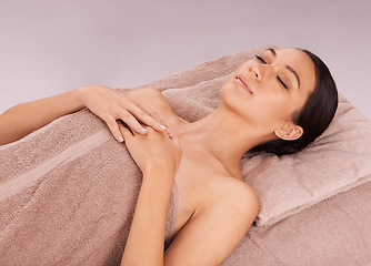 Image showing Spa, massage and calm with woman, wellness and peaceful lady isolated on beige studio background. Person, mockup space and person with vacation and stress relief with hospitality industry and holiday
