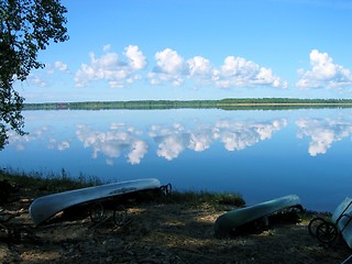 Image showing Canoes by lake