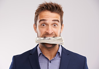 Image showing Portrait, man and cash in his mouth, employee and prize with investment on white studio background. Face, accountant and trading with person biting money and entrepreneur with bonus, rich or salary