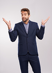 Image showing Man, fashion and portrait for shrug and clueless with tuxedo or suit and isolated for puzzled, uncertain and confused. Young person and handsome with hands up for unsure and vision in formal clothes