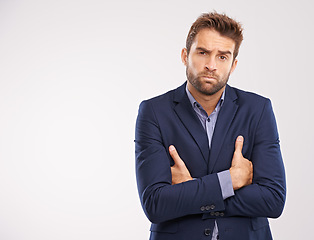 Image showing Entrepreneur, man and studio with arms crossed on white background with deadline and business concern. Portrait, entrepreneur and confident with company growth in suit and professional with mockup