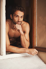 Image showing Portrait, window and shirtless man in home with confidence, relax and thinking in apartment alone in the morning. Face, body and male person with muscle, strong abs and health in house in Portugal