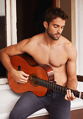 Image showing Guitar, learning or man in home for music, performance or entertainment with sound, rhythm or talent. Playing solo, topless artist or creative musician with an instrument for practice routine alone