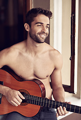 Image showing Man, guitar or home to relax as inspiration, thinking or idea of future, or vision on break with smile. Memory, shirtless or happy artist playing with musical instrument to remember, chill or rest