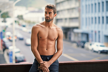 Image showing Man, sexy and shirtless with muscle on balcony with confidence or pride, relax and thinking on vacation in morning. Male person, topless and strong in city with abs, fit and outside in San Francisco