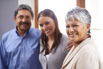 Image showing Adult daughter, senior parents and portrait with happiness and home with vacation and weekend visit. Apartment, old mother and mature father with break and relaxing in a lounge with smile or chilling