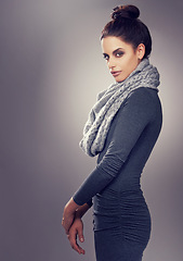 Image showing Woman, studio and portrait of winter fashion, beautiful and standing female person with wool clothes and cosmetic beauty. Makeup, face and comfort for warm style on model, confident on background