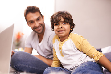 Image showing Portrait, father and child with laptop in bed for connectivity, technology and streaming online for cartoon. Family, man and young boy at home with computer, movie and bonding together in bedroom