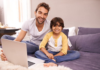 Image showing Portrait, father and child with laptop in bed for connectivity, technology and streaming online for cartoon. Family, man and young boy at home with computer, movie and bonding together in bedroom